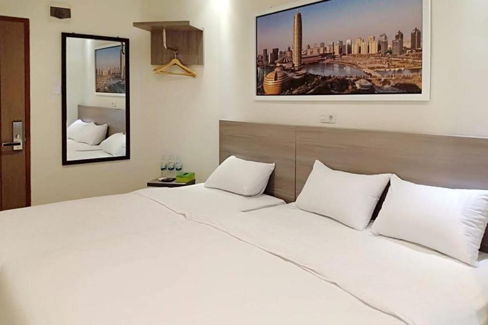 Twospaces Living At Maximus Inn Palembang Buitenkant foto
